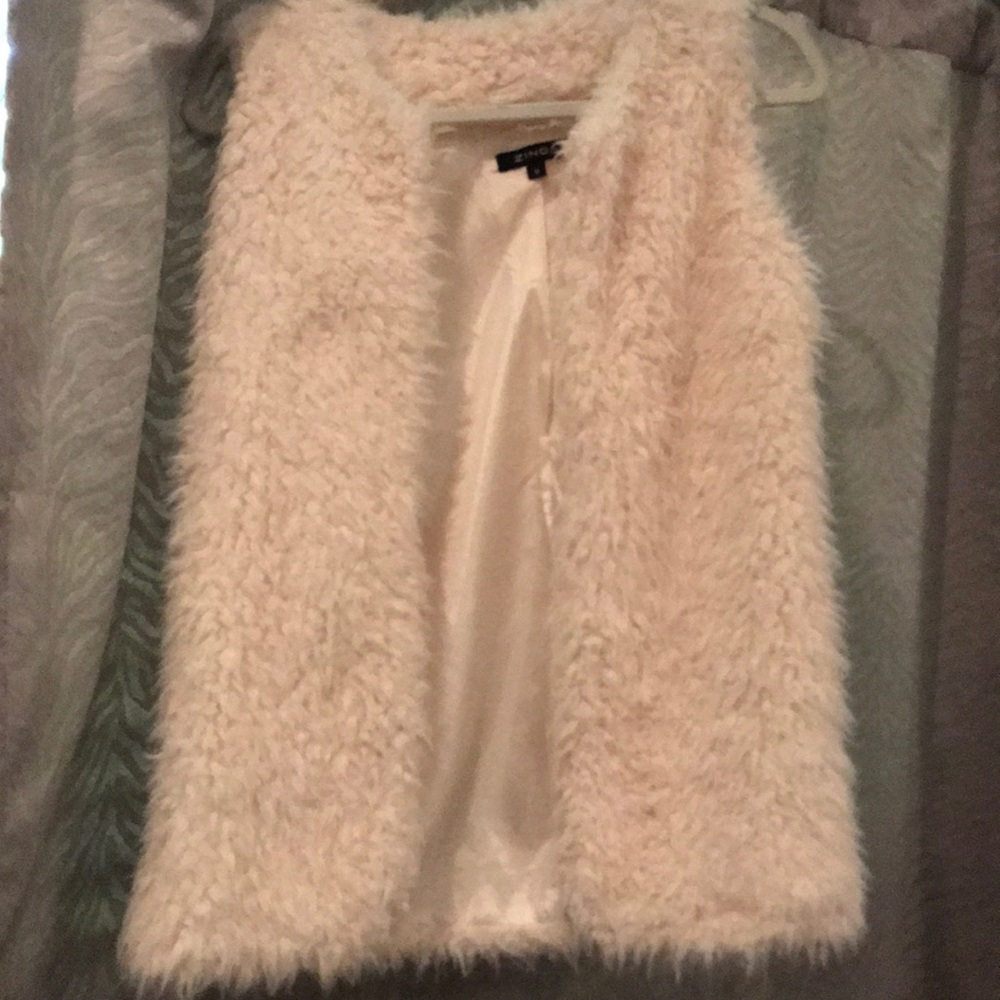 White faux fur vest